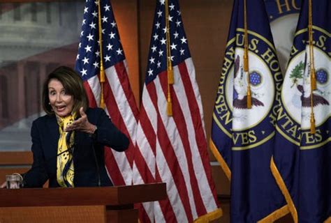 nancy pelosi yellow hermes scarf|Nancy Pelosi dresses.